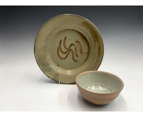 A Studio pottery bowl possibly by Richard Batterham and a stoneware studio pottery charger with sgraffito decoration, the bow