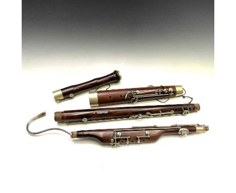 A Bassoon stamped Hawke &amp; Son Denman street Piccadilly Circus London 42 in a leather case stamped 8th BATTN Sherwood Forr