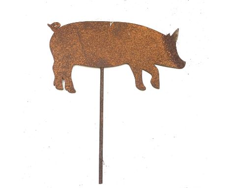 A sheet metal weather vane mount in the form of a pig. Overall height 39cm.