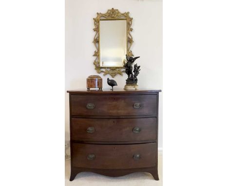 A Regency mahogany and ebony strung bow fronted chest of three long drawers, on bracket feet, height 91cm, width 92cm, depth 