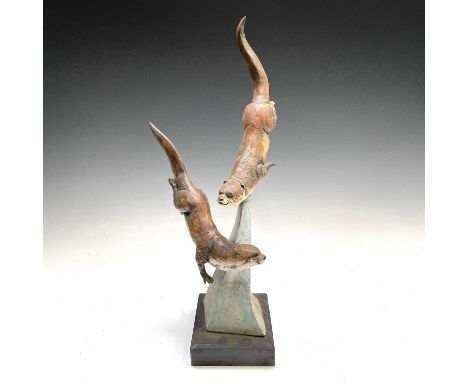 David COOKE (1970)Ceramic ottersInitialledCondition report: Height 50cm, width 24cm. There looks to be restoration to the top