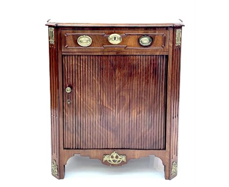 A Dutch mahogany side cabinet, circa 1800, of slightly tapered section with brass fittings and mounts and fitted a long drawe