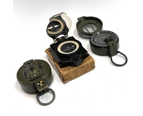 A Francis Barker M88 prismatic marching compass, together with a Stanley London brass marching compass both in green finish a