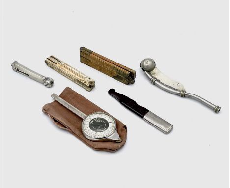 A 19th century bone folding 12 inch ruler, a Preston and Ibbotson boxwood and brass folding 12 inch ruler, a Napier folding c