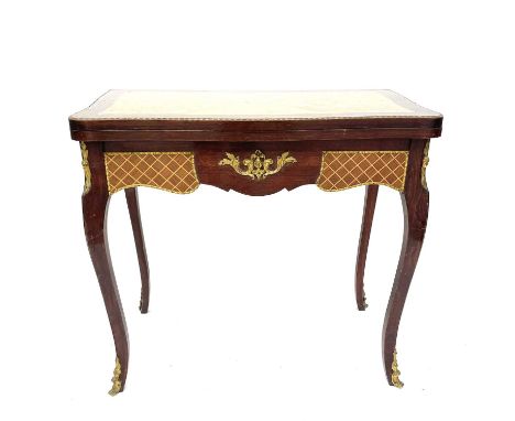 A reproduction kingwood and inlaid Louis XVI style swivel top card table with green baize top, with gilt metal mounts and cab