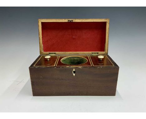 A 19th century mahogany rectangular tea caddy the interior fitted with two lidded compartments, height 15.5cm width 31cm dept