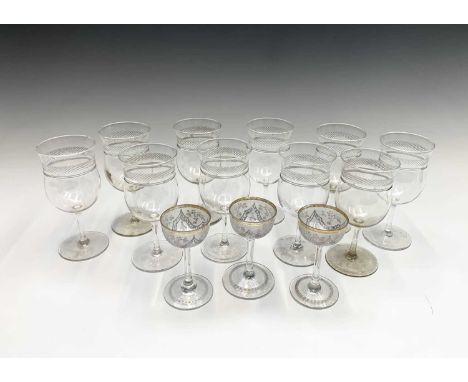 A set of ten Edwardian white wine glasses, the thistle shape bowls with cut bands, height 13cm, together with three painted l