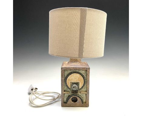 A Troika pottery lamp base, of square section, decorated in low relief to two opposing sides with geometric motifs, painted m