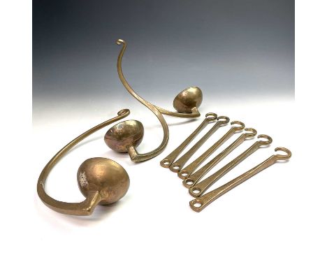 A Spanish bronze hanging lamp, 19th century, with two holders on swept supports, a single example and six support brackets.