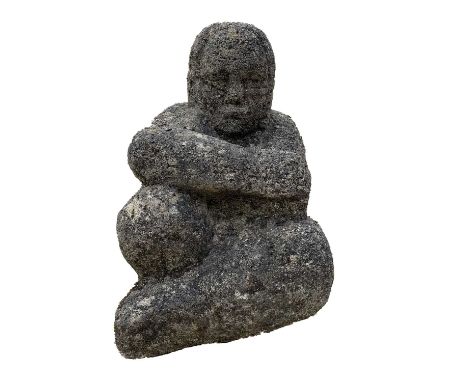 A reconstituted stone seated female form. height 34cm.Provenance: From the Estates of June Barrington Ward & Maggie Cameron F