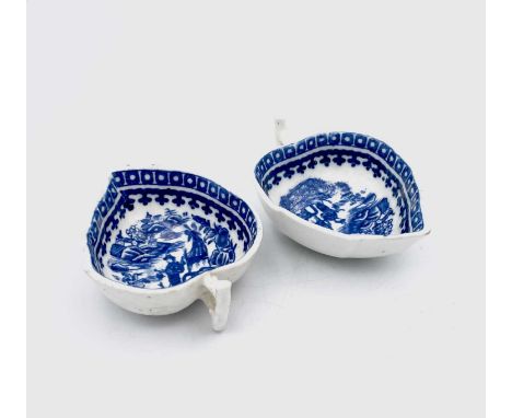 A Worcester porcelain blue and white butter boat, printed with the fisherman pattern, width 9cm, together with another simila