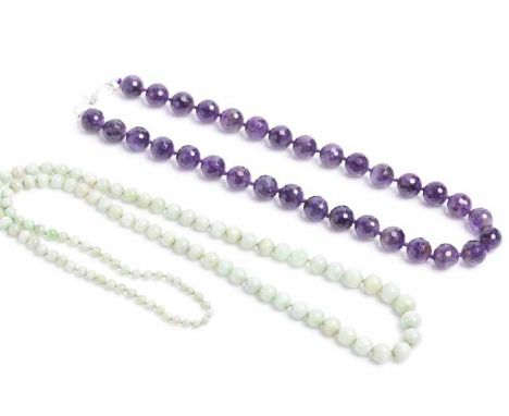 FACETED AMETHYST BEAD NECKLACE AND A GRADUATED JADE BEAD NECKLACE
the amethyst necklace with beads measuring 12mm diameter ap