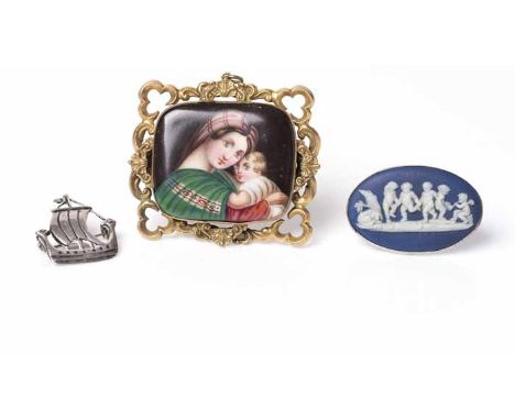 VICTORIAN PORTRAIT BROOCH 
hand painted to depict a woman and child, with scrolling border, unmarked, together with a Wedgewo
