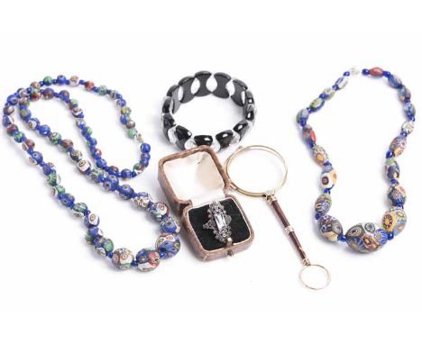 COLLECTION OF VINTAGE JEWELLERY
comprising of two coloured bead necklaces, black and white glass bead bracelet, a blue gem an