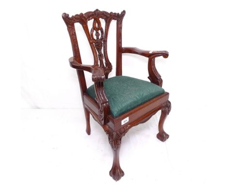 A Chippendale style carved mahogany doll's armchair 
