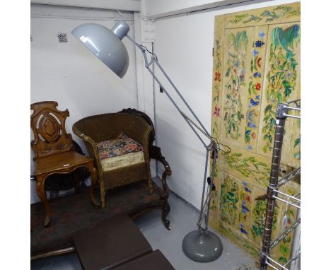 A grey painted metal anglepoise floor lamp 