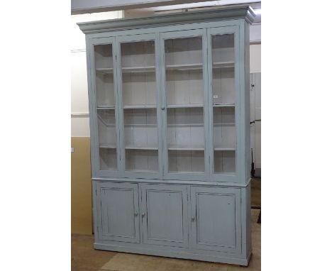 A large Vintage painted pitch pine Continental bookcase, with glazed and panelled cupboard doors, W185cm, H250cm, D45cm (this