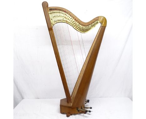 A 41-string pedal harp, by Pilgrim Harps, height 5'Good overall condition with no splits to the sound board or body. The bras