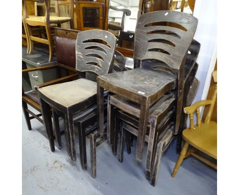 A set of 7 stained ply ladder-back style stacking chairs 