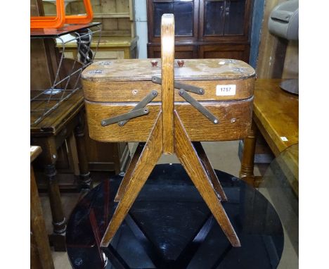 A Vintage bent-ply cantilever sewing cabinet 