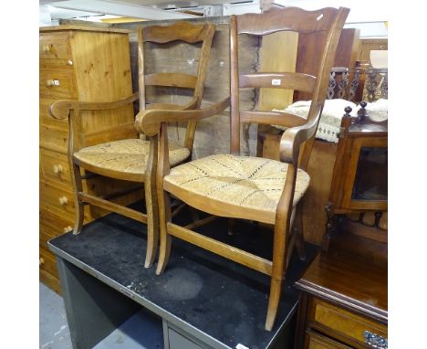 A pair of French walnut ladder-back rush-seated elbow chairs 
