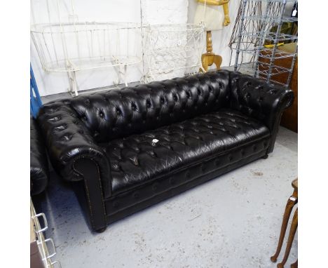 A black leather button-back rollover arm Chesterfield, L195cm, H70cm, seat height 40cm and depth 50cm (WITH THE OPTION TO PUR