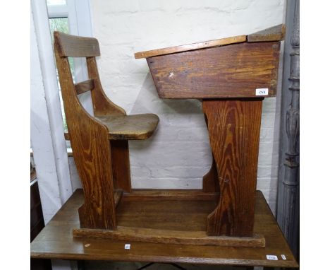 A Vintage pine and elm school desk with sliding top, W46cm, H84cm 