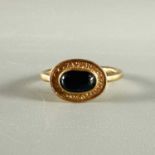 Ring Gold 750, dunkelblauer Stein (evtl. Saphir), Gewicht ca. 5,08 Gramm