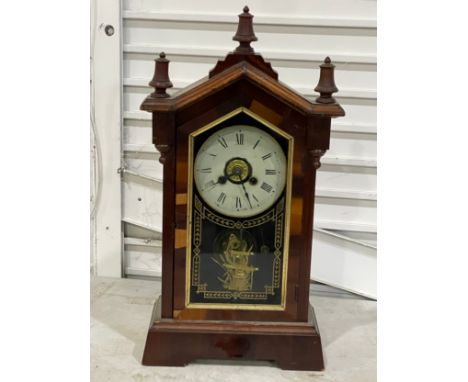 2 mantle clocks. A late 19th Jerome &amp; Co mantle clock with key and pendulum. A vintage mantle clock with pendulum 