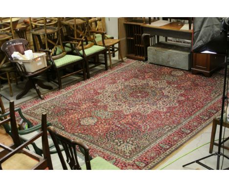 Large vintage red ground carpet 