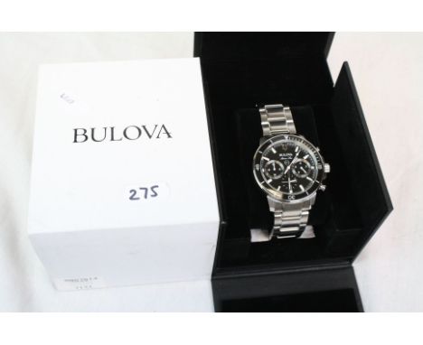 Boxed gents Bulova "Marine Star" quartz chronograph wristwatch with black dial &amp; enamel bezel and three sub dials plus da