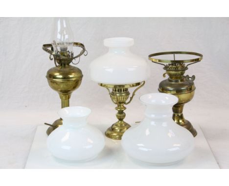 Three vintage oil lamp with shades and chimneys 