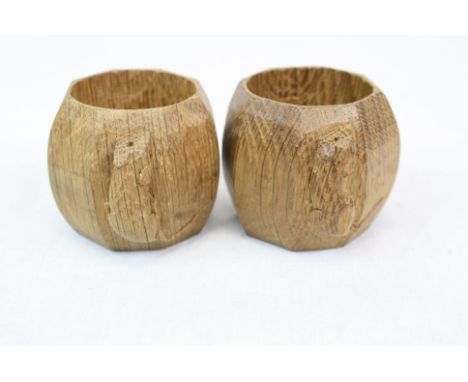 Pair of "Mouseman" carved Oak Napkin rings, each approx 4.5cm diameter