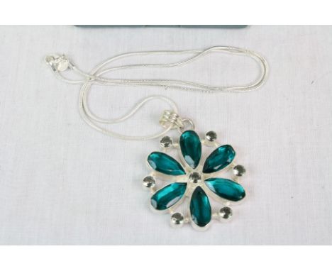 Silver flower design pendant on silver chain 