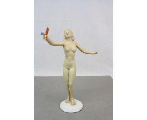 Schau Bach Kunst ceramic model of a Nude female, Art Deco style with coloured Bird on her hand, stands approx 22.5cm
