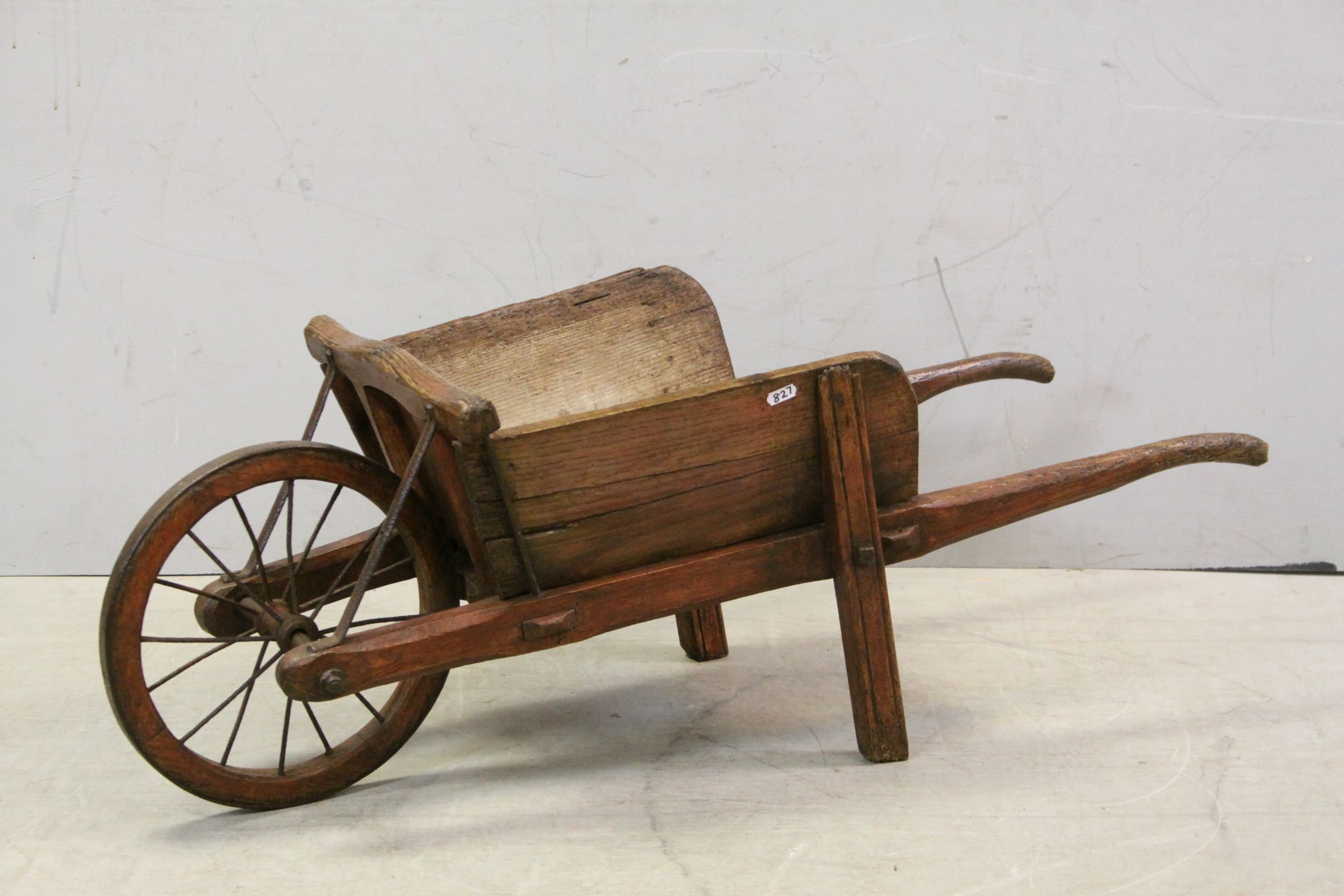 Early vintage wooden childs wheelbarrow