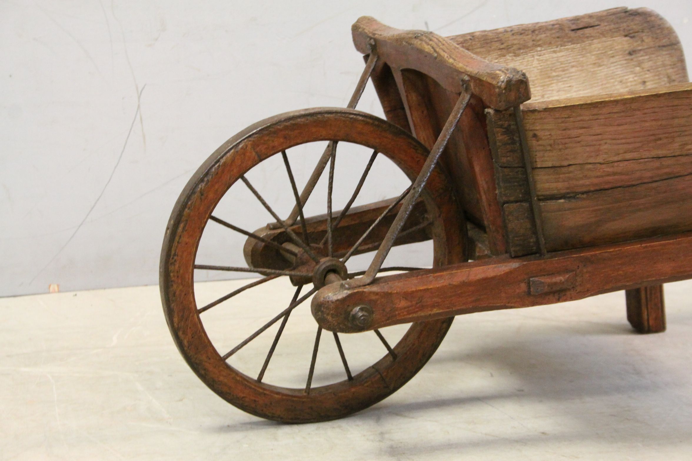 Early vintage wooden childs wheelbarrow