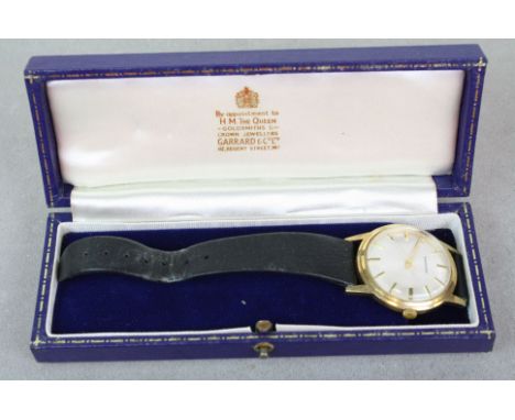 Boxed Gents Hallmarked 9ct Gold Garrard wristwatch, marked to the silvered dial with sweep seconds hand and vintage Leather s
