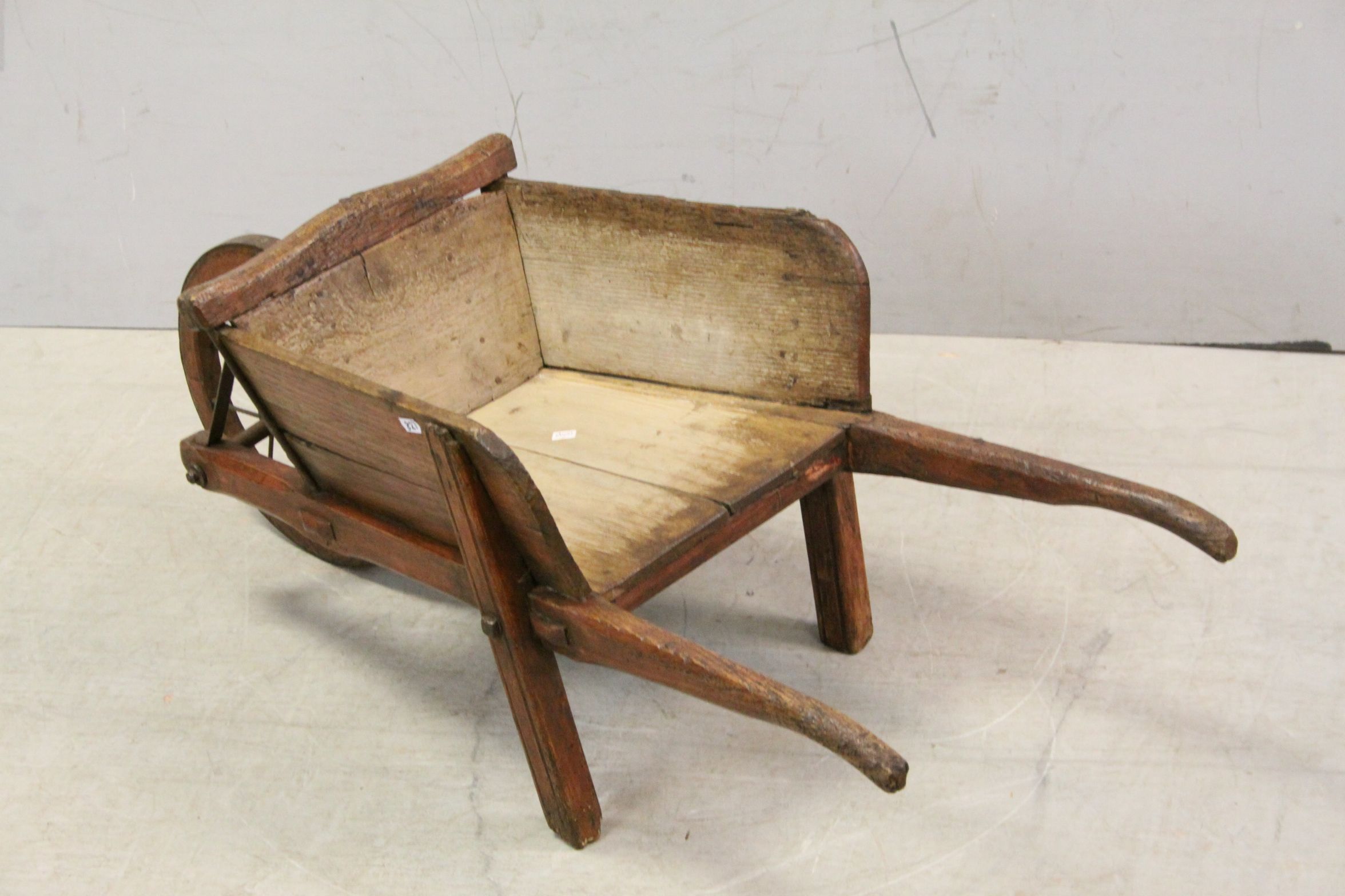 Early vintage wooden childs wheelbarrow