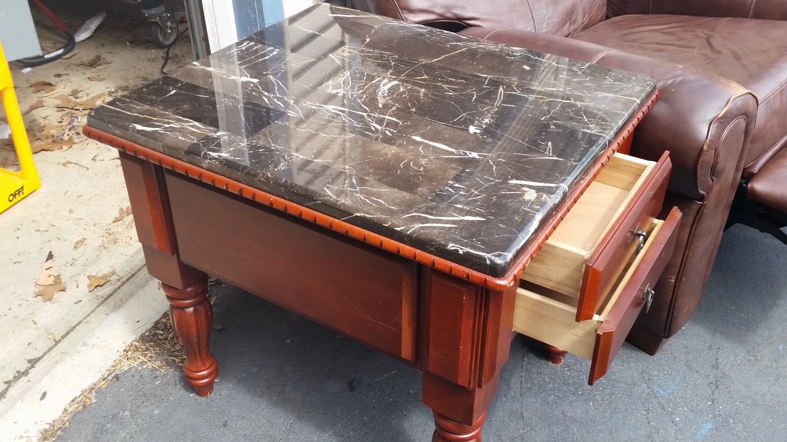 Recliner with one drawer end table.