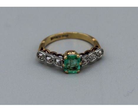 Art Deco Emerald and diamond ring in 18ct gold and platinum. Emerald has limited inclusions. Diamonds are old European cut, s