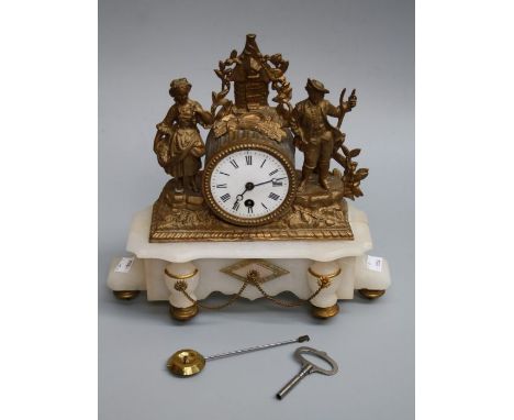 A late 19th century French gilded spelter drum case mantle clock, the surmount cast with harvesters around an enamel Roman di