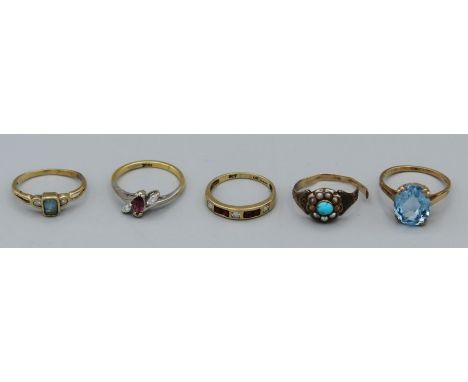 A selection of five rings comprising a yellow metal ring set with diamonds and a pink stone, stamped 18k, gross weight approx