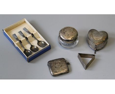 A selection of hallmarked silver items comprising of three teaspoons in a box, a lidded glass dish with masonic emblem, a mas