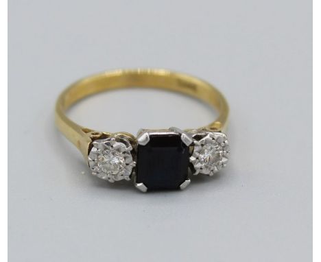 A sapphire and diamond trilogy ring on a yellow metal shank stamped 18k&nbsp;