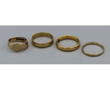 A selection of gold band rings to include a 22ct gold ring (hallmarked), approx gross weight 5.3gm, an 18ct gold (hallmarked)