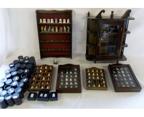 Large quantity of mainly ceramic and glass thimbles with display cabinets