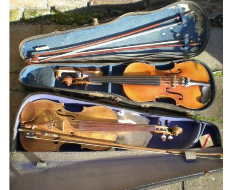 2 cased violins with 3 bows one with fake printed paper Stradivarius label to interior