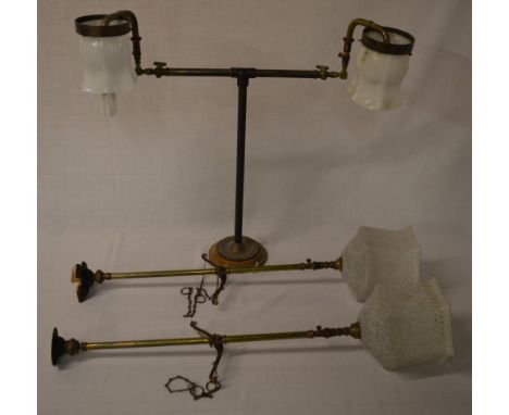 Pair of gas lamps converted to run on electricity and a ceiling light