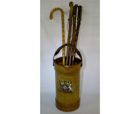 Leather & canvas cordite carrier used as a stick stand & 4 walking sticks